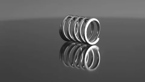 Bright rolling spring on a reflecting surface Stock Footage 83796592