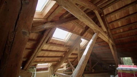 Bright Roof Loft conversion interior with skylights and wooden timbers Stock Footage 307941634