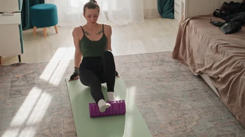 Bright room stretching routine. Caucasian woman practicing morning exercise Stock Footage 337562088