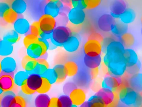 Bright round colored spots on a white background, unfocused background Stock Illustration