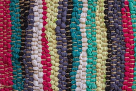 Bright rustic rug. Stock Photos