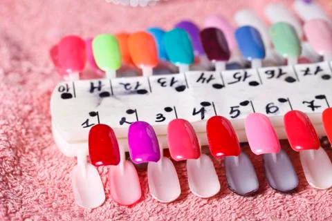 Bright samples of nail polish Stock Photos