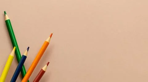 Bright school supplies on plain background Stock Photos