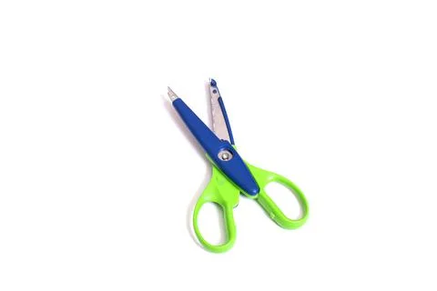 Bright scissors for cutting patterns isolated on white background Stockfoto's
