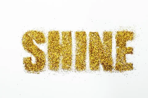 Bright sequins text on white background. shine Stock Photos