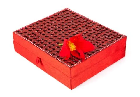 Bright simple red box for make-up, jewelry, decorations with beautiful flower Stock Photos