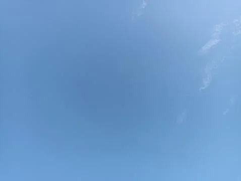 Bright sky background texture. Daytime air, bright blue sky and white clouds Stock Photos