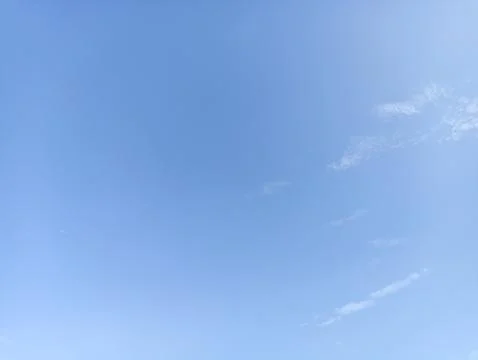Bright sky background texture. Daytime air, bright blue sky and white clouds Stock Photos