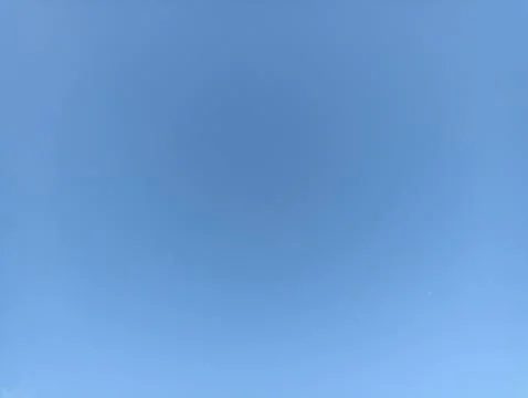 Bright sky background texture. Daytime air, bright blue sky and white clouds Stock Photos