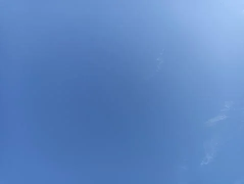 Bright sky background texture. Daytime air, bright blue sky and white clouds Stock Photos