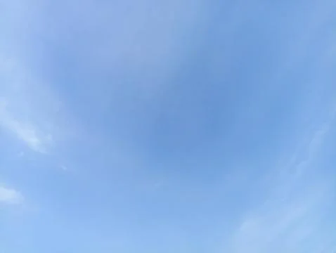 Bright sky background texture. Daytime air, bright blue sky and white clouds Stock Photos