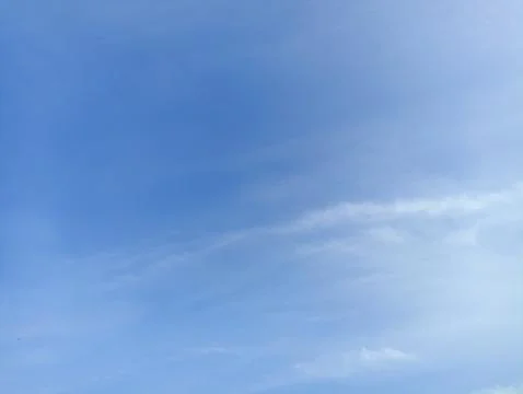 Bright sky background texture. Daytime air, bright blue sky and white clouds Stock Photos