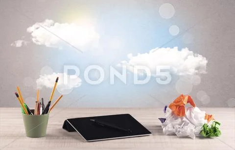 Bright sky with clouds and office desk Stock Photos
