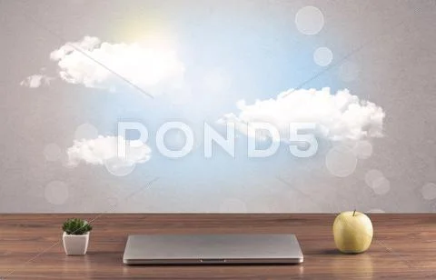 Bright sky with clouds and office desk Stock Photos