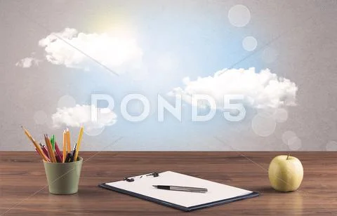 Bright sky with clouds and office desk Stock Photos