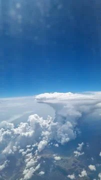 Bright Sky Framed by Fluffy Clouds. Nature Background. Clear Sky. Climate C.. Stock-Fotos