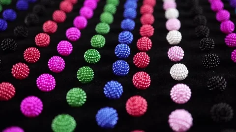 Bright Small Beads On Dark Fabric. Stock Footage 305404356