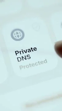 Bright smartphone setting confirming private DNS is protected Stock Photos