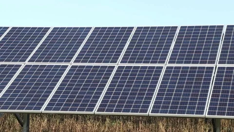 Bright Solar Array in Open Field Stock Footage 118001562