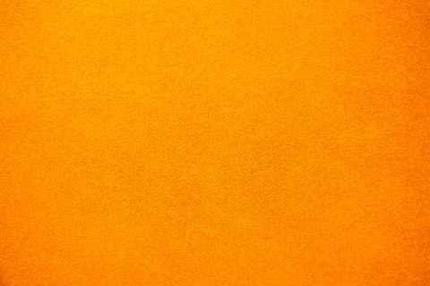 Bright solid color background. Empty orange surface with fine texture. Prepar Stock Photos