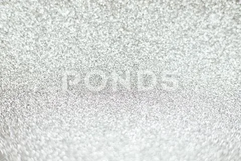 Bright sparkle silver background. Holiday and festive concept. Stock Photos
