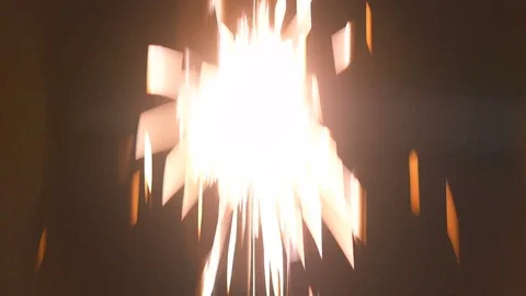 The bright sparks on the black background. anamorphic lens shot Video stock 81047318