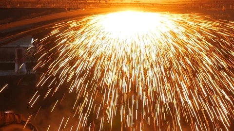 Bright sparks fall down from the welder's gas burner Video stock 87505710