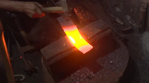 Bright Sparks from Grinding Iron in Workshop Stock Footage 319958542