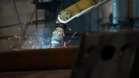 Bright sparks from robot welding Stock Footage 128354839