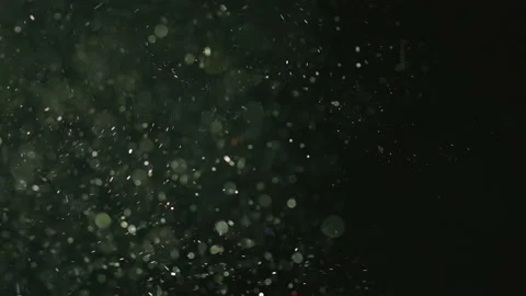 The bright splash of shimmering particles. slow motion Stock Footage 159625233