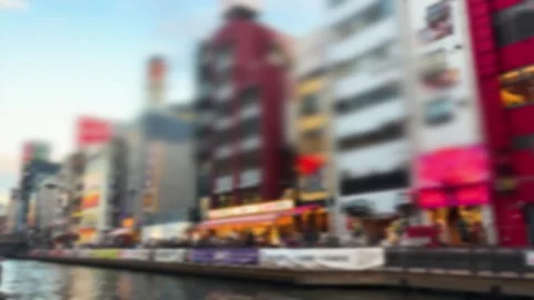 Bright spring evening street view of Dotonbori district in Osaka, Japan. Stock Footage 335464348