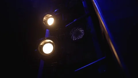 Bright stage lights turning on, illuminating dark theater Stock Footage 301564282