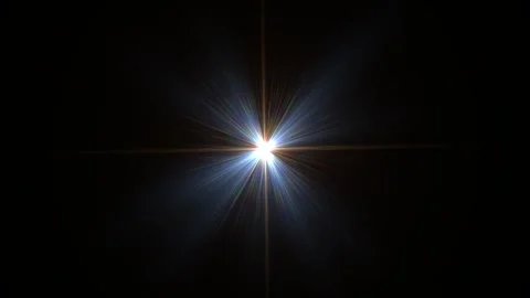 Bright Starburst Light Effect in Darkness with Radiant Central Glow Stockbeeldmateriaal 340412680
