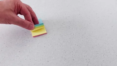 Bright Sticky Notes Stack in Hand- Stationery for Creative Planning 스톡 동영상 318641122