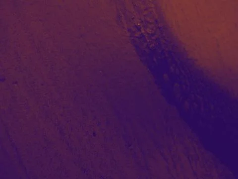 Bright streaks of paint on a wall. Empty abstract background. Stock Photos
