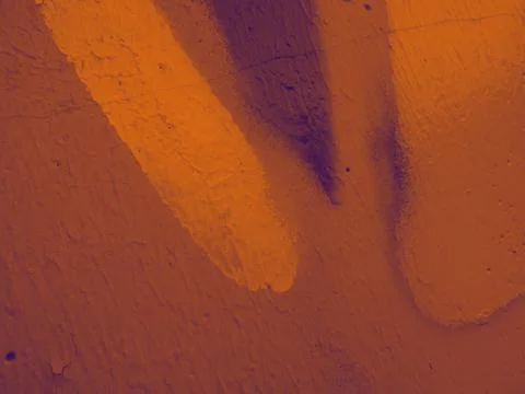 Bright streaks of paint on a wall. Empty abstract background. Stock Photos