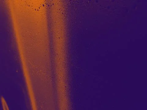 Bright streaks of paint on a wall. Empty abstract background. Stock Photos