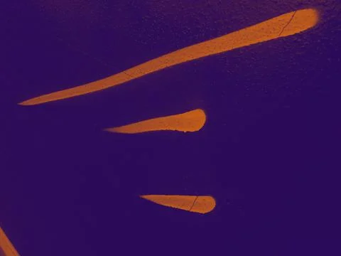 Bright streaks of paint on a wall. Empty abstract background. Stock Photos