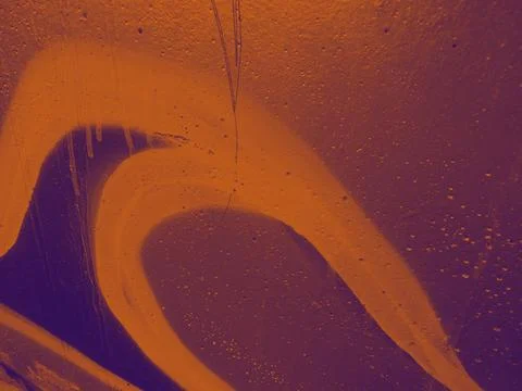 Bright streaks of paint on a wall. Empty abstract background. Stock Photos
