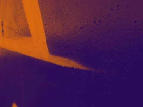 Bright streaks of paint on a wall. Empty abstract background. Stock Photos