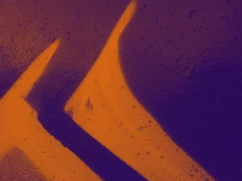 Bright streaks of paint on a wall. Empty abstract background. Stock Photos