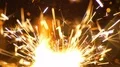 The bright stream of a sparks on the black background. slow motion 4k or 4k+ Resolution