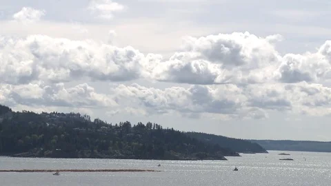Bright summer day on the ocean with clouds Stock Footage 75245630