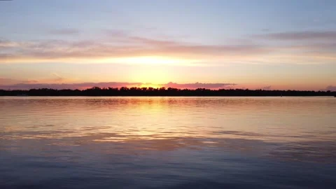 Bright Summer Sunset over the River. Flying with Drone. Stock Footage 165438335