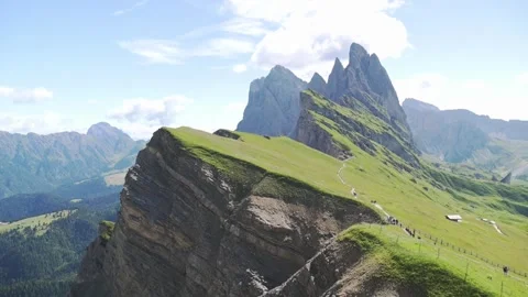 Bright summer view of Seceda peak with clear skies and vast alpine scenery in Stock Footage 318667697