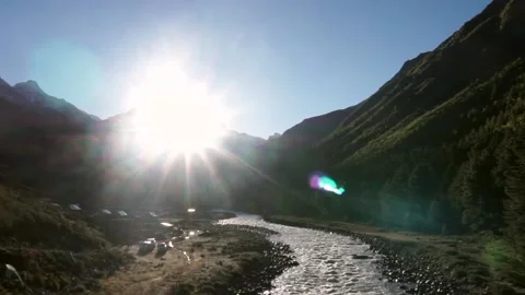 Bright sun and the clean river flowing in the mountains - fresh water, valley Stock Footage 201982377