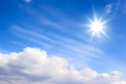Bright sun and clouds Stock Photos