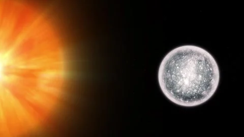 Bright sun and a gray moon or planet in dark space with glowing light Stock Footage 340383484