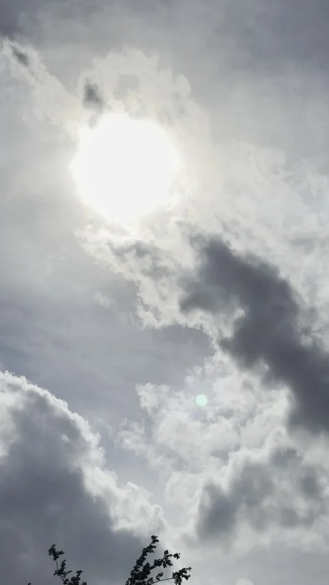 Bright Sun Behind Gray Storm Clouds Stock Footage 345515146