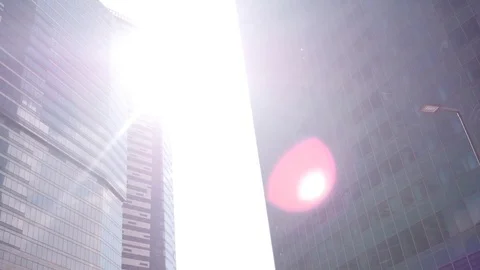 The Bright Sun Between the Skyscrapers Stock Footage 77082400